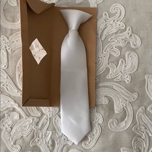 White clip on tie.   Never used for Communion.
